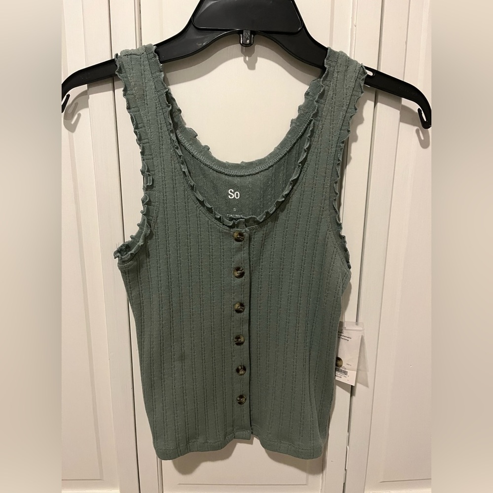 So green/turquoise tank top.